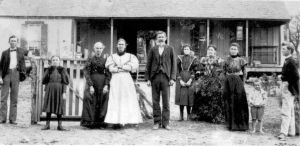 This photograph was taken about 1895, in front of the Johnson homestead. The successor house still stands just across the road from the Johnson family cemetery. The young girl in the picture, looking a bit angry and defiant, is my grandmother, Jessie Johnson (later Jessie Hatcher). She was the youngest of all the children, born in 1887. I find it very interesting that my grandmother lived and is buried in the very same place, about 85 years apart -- she died in 1973. I knew her quite well, she was my only living grandparent and a real influence as I was growing up. Through her especially I met a lot of the older Christadelphians of her generation and heard lots of stories. 