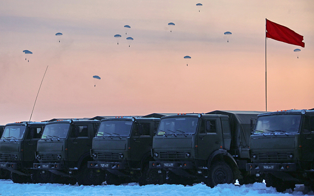KOSTROMA REGION, RUSSIA. JANUARY 23, 2016. Servicemen of the 98th Guards Airborne Division of the Russian Airborne Troops descending with parachutes during military exercises. PHOTOGRAPH BY TASS / Barcroft Media UK Office, London. T +44 845 370 2233 W www.barcroftmedia.com USA Office, New York City. T +1 212 796 2458 W www.barcroftusa.com Indian Office, Delhi. T +91 11 4053 2429 W www.barcroftindia.com